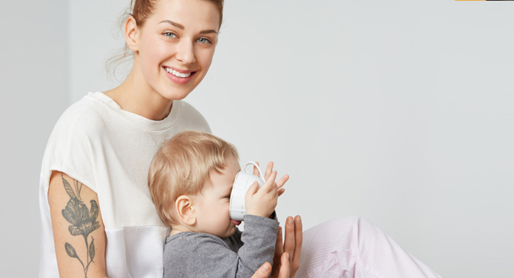 Woman Looking After A Child