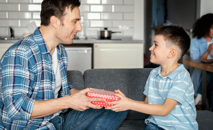 Son Giving Gift To Dad