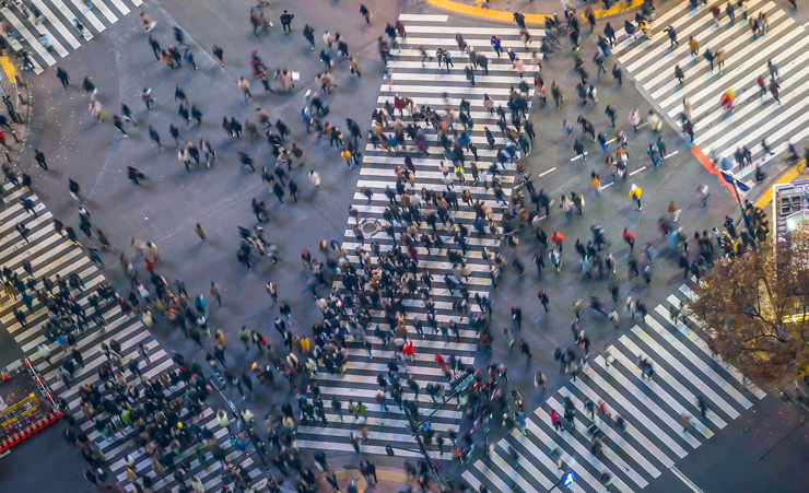 Lots Of People Shopping Crossing Road