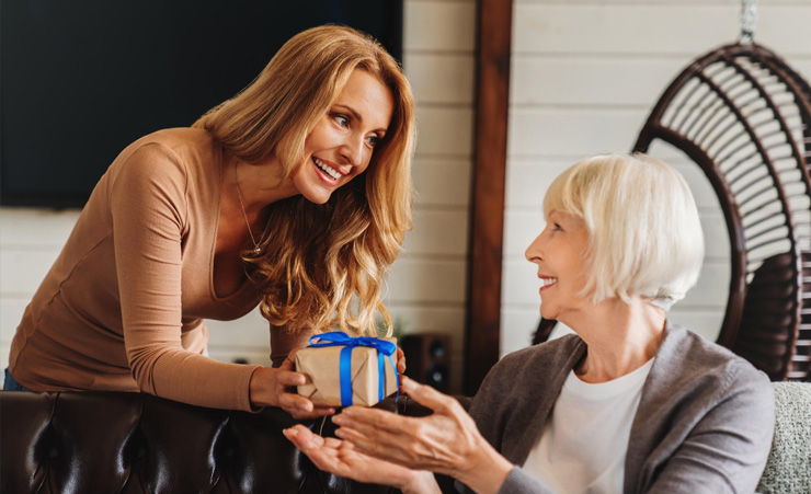 Older Woman Receiving Gifts