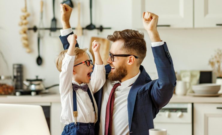 Father At Home Working With Kids