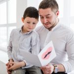 Father Reading Card From Son