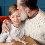 Grandson Giving Grandad A Gift