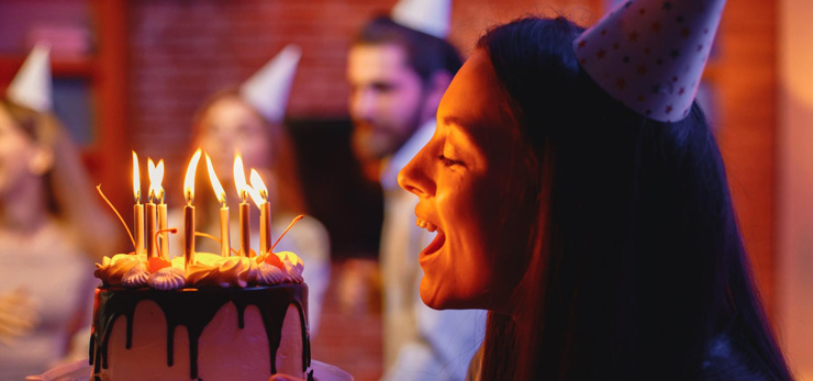 Birthday Celebreation Woman Blowing Candle