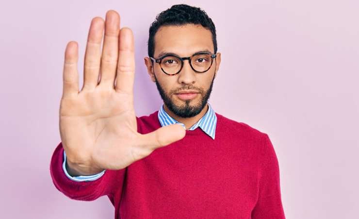 Forbidden Gifts Man Holding Up Hand To Stop