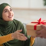Muslim Woman Accepting Christmas Gift