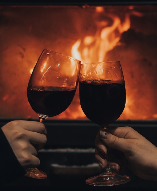 Drinking Wine By Fireplace Winter