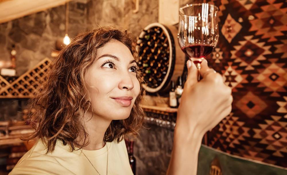 Woman Wine Expert Inspeting Wine