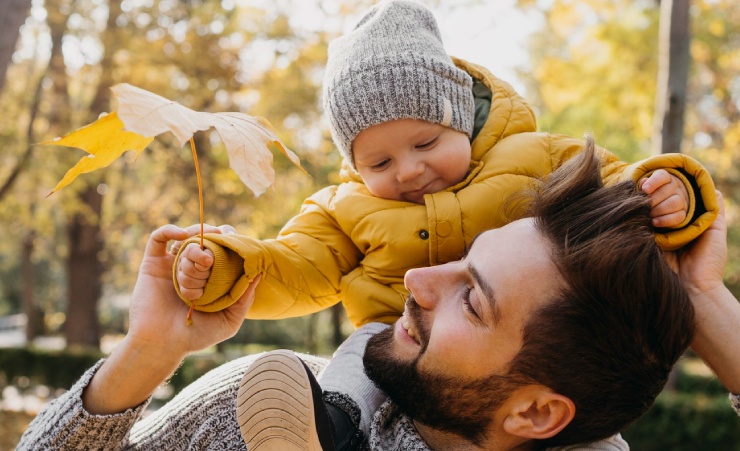 Dad With Baby On Shoulder