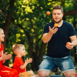 Father Juggling Showing Off At Picnic