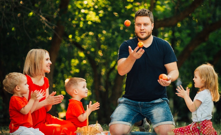 Father Juggling Showing Off At Picnic