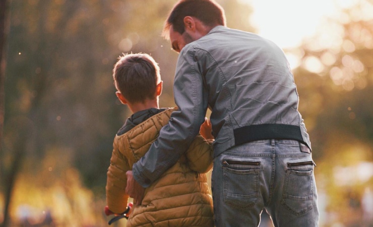 Father Teaching Son To Ride Bike Photo