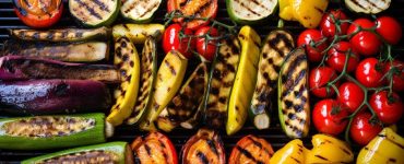 Variety of vegetables roasting on a bbq grill
