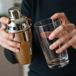 Person Holding Cocktail Shaker