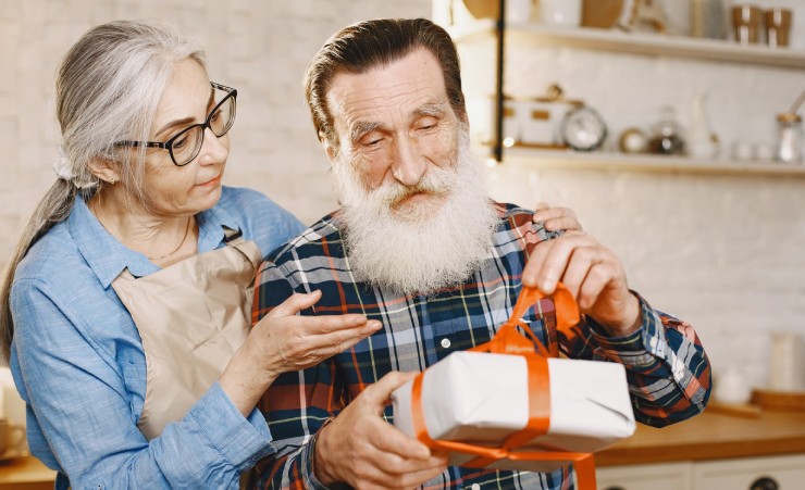 Grandad Opening Christmas Gift