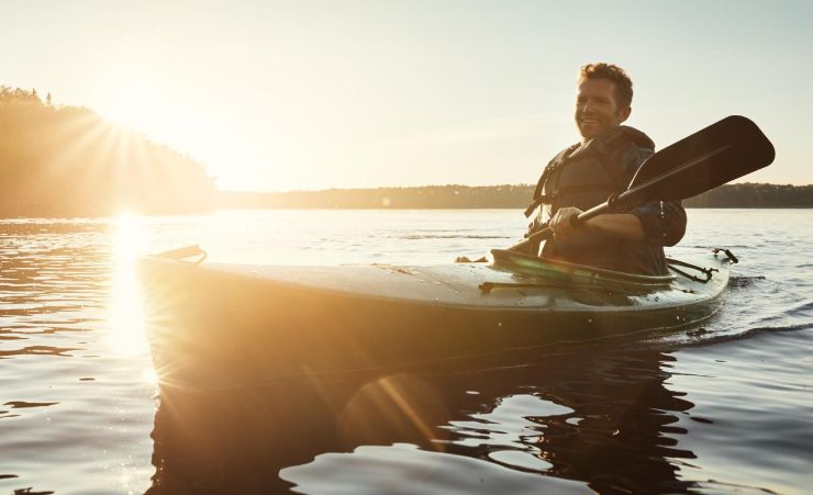 Dad Kayaking River