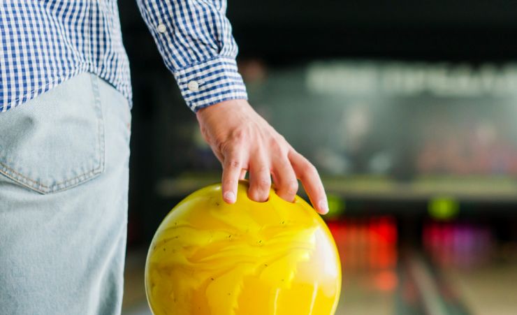 Man Holding Bowling Ball
