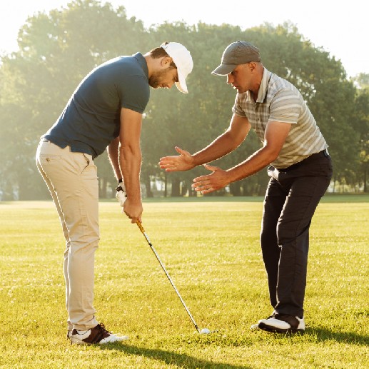 Man Learning To Play Golf
