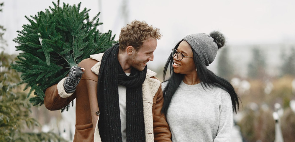 A couple buying a Christmas tree