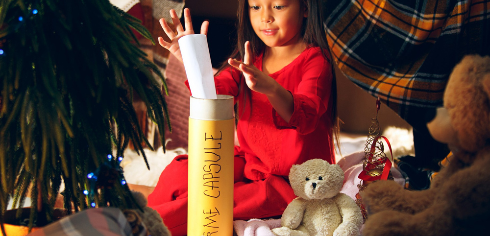 A Child Making A Time Capsule For Christmas