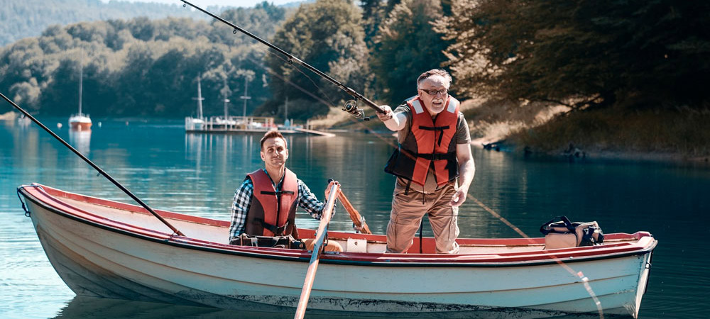 fishing on a boat with father