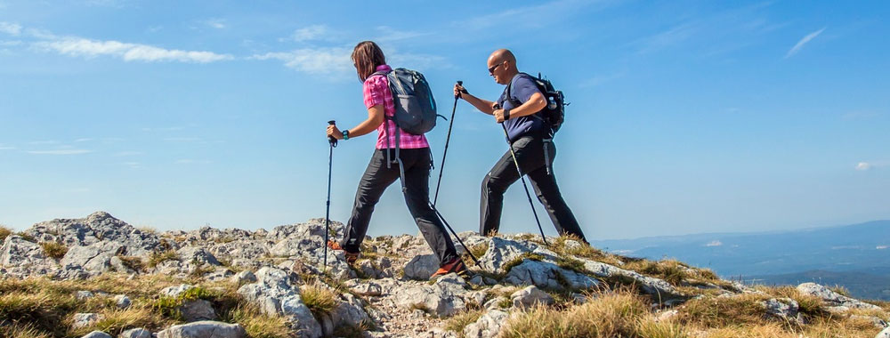 daughter hiking with father