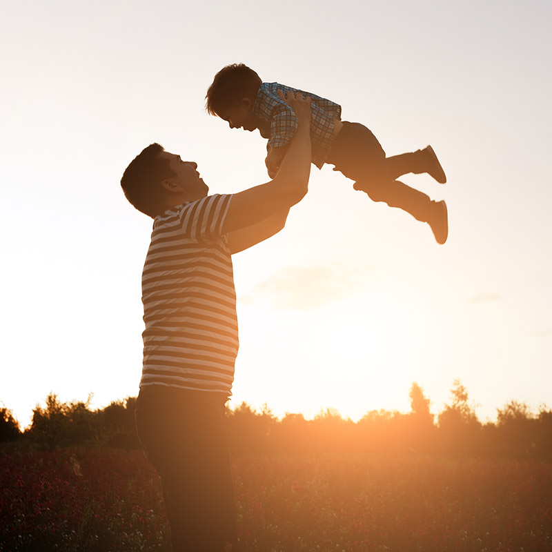 Father and Son In Sunset